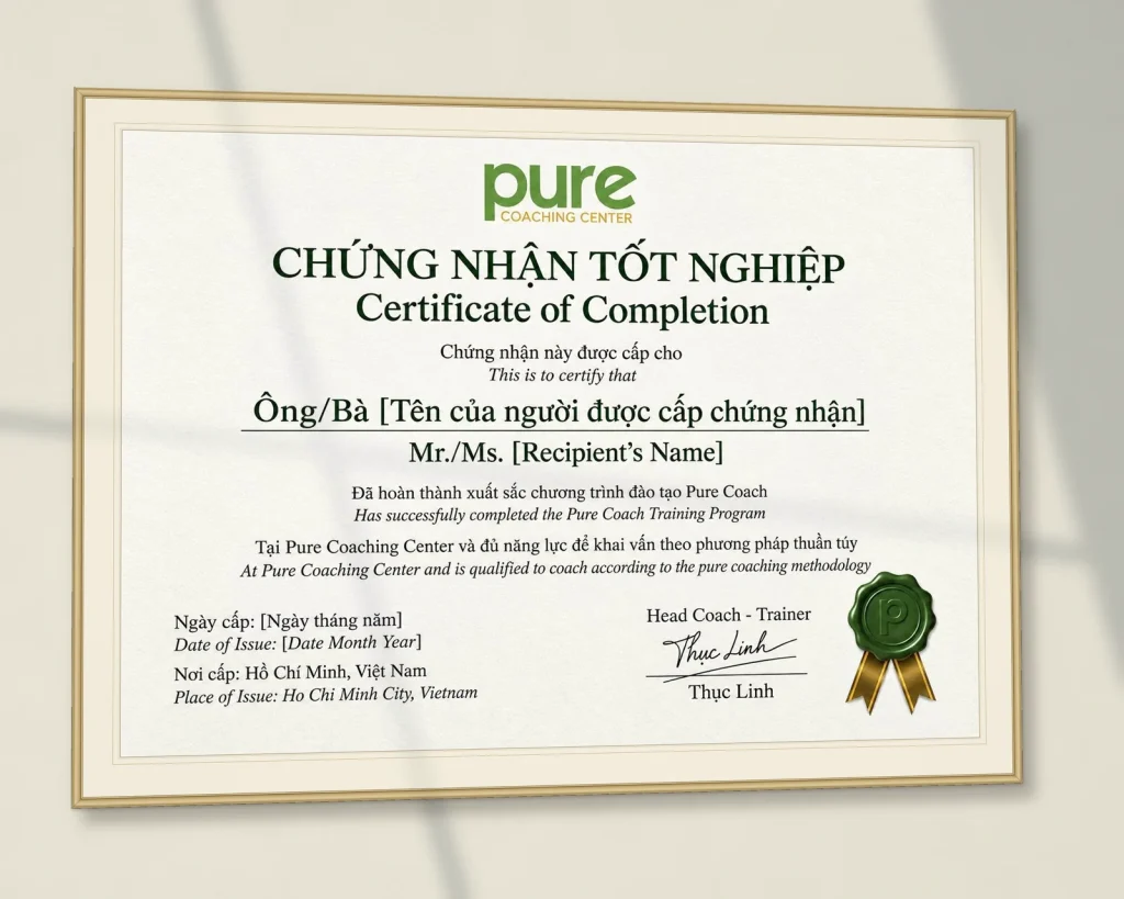 Chứng nhận tốt nghiệp chương trình đào tạo Pure Coach của Pure Coaching Center, khung viền vàng treo tường